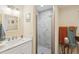Bathroom features a marble countertop vanity and a modern glass shower at 1939 Hawaii Ne Ave, St Petersburg, FL 33703