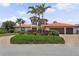 Stunning home with a red tile roof, lush landscaping, and a three-car garage at 1939 Hawaii Ne Ave, St Petersburg, FL 33703