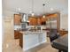Bright kitchen with stainless steel appliances, custom cabinets, and a central island at 1939 Hawaii Ne Ave, St Petersburg, FL 33703