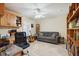 Versatile office space includes built-in bookshelves, a comfortable sofa, and ample natural light at 1939 Hawaii Ne Ave, St Petersburg, FL 33703