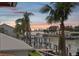 Sunset view overlooking the tranquil waterway and city skyline in the distance at 1939 Hawaii Ne Ave, St Petersburg, FL 33703