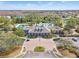 Aerial view of a community center with a pool, lush landscaping, and manicured grounds at 20053 Heritage Point Dr, Tampa, FL 33647