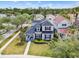 Charming two-story home featuring a well-manicured lawn, a covered porch, and a classic architectural design at 20053 Heritage Point Dr, Tampa, FL 33647