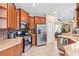 Modern kitchen featuring stainless steel appliances, ample cabinet space, and tile flooring at 20053 Heritage Point Dr, Tampa, FL 33647