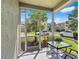 Relaxing screened patio with furniture overlooking landscaped backyard and neighborhood at 20053 Heritage Point Dr, Tampa, FL 33647