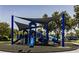 Community playground featuring modern equipment and shade canopies for sunny days at 20053 Heritage Point Dr, Tampa, FL 33647