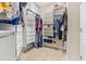 Organized walk-in closet with custom shelving and storage, maximizing space and functionality at 20053 Heritage Point Dr, Tampa, FL 33647