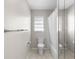 Cozy bathroom with a toilet, shower with curtain and mirrored wall at 204 Cactusflower Ln, Sun City Center, FL 33573