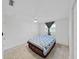 Bedroom features a ceiling fan and tiled floors at 2501 Harn Blvd # H39, Clearwater, FL 33764