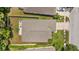 Aerial shot showcases home's roof, backyard, and location within a well-maintained neighborhood at 25304 Lexington Oaks Blvd, Wesley Chapel, FL 33544