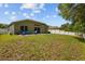 Spacious backyard with seating area at 25304 Lexington Oaks Blvd, Wesley Chapel, FL 33544