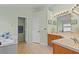 Bathroom featuring double sinks, tub, and vanity at 25304 Lexington Oaks Blvd, Wesley Chapel, FL 33544