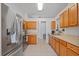 Spacious kitchen featuring stainless steel appliances and lots of counter space at 25304 Lexington Oaks Blvd, Wesley Chapel, FL 33544