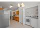 Kitchen featuring a laundry area with modern appliances and ample space at 25304 Lexington Oaks Blvd, Wesley Chapel, FL 33544