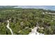 Expansive aerial view of the nature preserve with dense vegetation at 2611 Eagle Crest Ct, Holiday, FL 34691