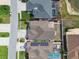 An overhead view of a beautiful neighborhood with mature trees and well maintained homes at 2611 Eagle Crest Ct, Holiday, FL 34691