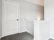 Hallway featuring plush carpeting and a storage closet at 2611 Eagle Crest Ct, Holiday, FL 34691