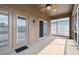 View from a screened-in patio, showcasing a door to the outside at 2611 Eagle Crest Ct, Holiday, FL 34691