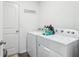 This laundry room features modern appliances and ample storage space at 26377 Bertram Rd, Brooksville, FL 34602