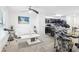 Open-concept floor plan featuring a living area that transitions into the kitchen at 26377 Bertram Rd, Brooksville, FL 34602