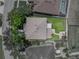 An aerial view of the property lines showcasing a well-maintained lawn at 27231 Liriope Ct, Wesley Chapel, FL 33544