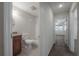 View of the bathroom with tub/shower combo adjacent to the hallway at 3073 Overlook Pl, Clearwater, FL 33760