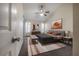 Bedroom with large bed, artwork, and a ceiling fan at 3073 Overlook Pl, Clearwater, FL 33760