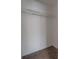 Walk in closet with carpet flooring and wire shelving at 3073 Overlook Pl, Clearwater, FL 33760