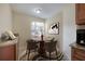 Dining area with seating for four, modern decor, and natural light at 3073 Overlook Pl, Clearwater, FL 33760
