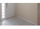 Tiled entryway with white door and window at 3073 Overlook Pl, Clearwater, FL 33760