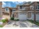 Charming home exterior featuring a two-car garage, well-maintained landscaping, and a welcoming entrance at 3073 Overlook Pl, Clearwater, FL 33760