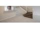 Foyer leads into living areas and view of staircase and kitchen at 3073 Overlook Pl, Clearwater, FL 33760