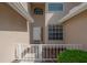 Inviting front entrance with a white picket fence and a pathway leading to the home's front door at 3073 Overlook Pl, Clearwater, FL 33760