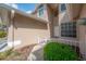 Charming front entrance featuring a well-manicured garden and a welcoming walkway to the front door at 3073 Overlook Pl, Clearwater, FL 33760