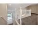 Carpeted staircase leading to the upper level, providing access to bedrooms and living spaces at 3073 Overlook Pl, Clearwater, FL 33760