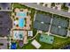 Overhead view of the various community amentities, including pools, tennis, and sport courts at 31050 Spruceberry Ct, Wesley Chapel, FL 33543