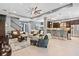 Open-concept living room seamlessly connects to the kitchen and dining area at 31050 Spruceberry Ct, Wesley Chapel, FL 33543