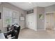 Spacious room with plantation shutters, neutral carpet and gray walls, offering ample storage with bi-fold closet doors at 3142 Stonegate Falls Dr, Land O Lakes, FL 34638