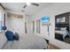 Bedroom with a ceiling fan, TV, closet and decorative accents at 3142 Stonegate Falls Dr, Land O Lakes, FL 34638