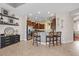 Well-lit kitchen with stainless steel appliances, breakfast bar, and pendant lighting at 3142 Stonegate Falls Dr, Land O Lakes, FL 34638