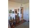 Bedroom with hardwood floors and view into another room at 361 Fairhaven St, Port Charlotte, FL 33952