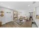 Inviting living area with large mirror and stylish furnishings at 3711 W Dale Ave, Tampa, FL 33609
