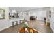 Open-concept space with kitchen and dining area, perfect for entertaining at 3711 W Dale Ave, Tampa, FL 33609