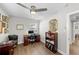Bright home office with a ceiling fan and hardwood floors at 3711 W Dale Ave, Tampa, FL 33609