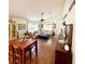 Spacious living area with a dining table, hardwood floors, and modern furnishings at 425 E Orange St, Tarpon Springs, FL 34689