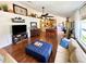 Inviting living area with vaulted ceilings, hardwood floors, and open concept design at 425 E Orange St, Tarpon Springs, FL 34689