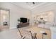 Open floor plan with light-colored furnishings, and contemporary decor at 4354 Barletta Ct, Wesley Chapel, FL 33543