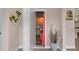 Hallway nook displaying a hidden door leading to a private room at 4354 Barletta Ct, Wesley Chapel, FL 33543