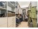 Organized walk-in closet with ample storage space and shelving at 4354 Barletta Ct, Wesley Chapel, FL 33543