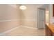 The Dining Area offers tile flooring and a view of the Kitchen at 4414 Plumosa St, Spring Hill, FL 34607